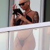 EXCLUSIVE: INF - Amber Roses Shows Off All Of Her Best Assets While Posing In A Revealing Thong Swimsuit On Her Balcony In Miami